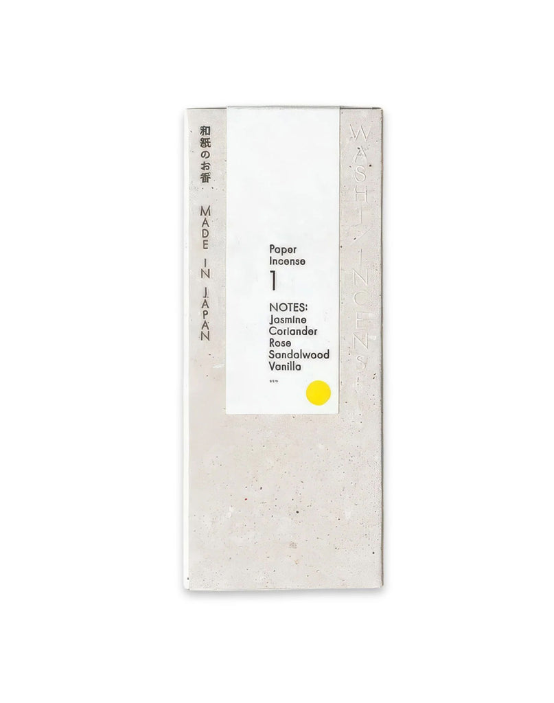 1 of 3.  White paper incense stick packaging with text and yellow circle on a white background