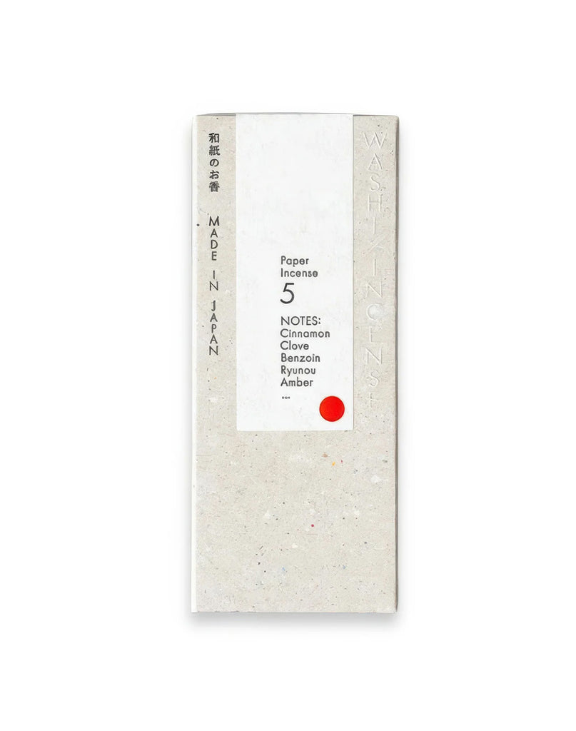 1 of 5.  White paper incense stick packaging with text and red circle on a white background
