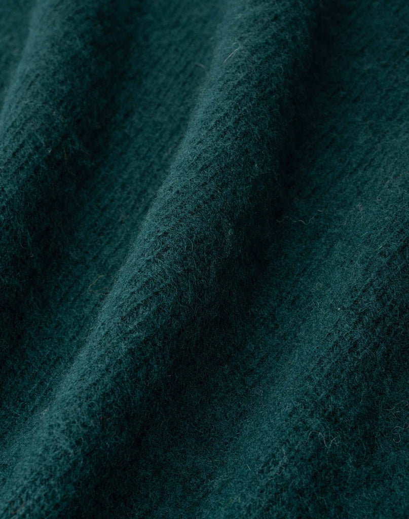 Photo 2 of 2 close-up wool material in forest color