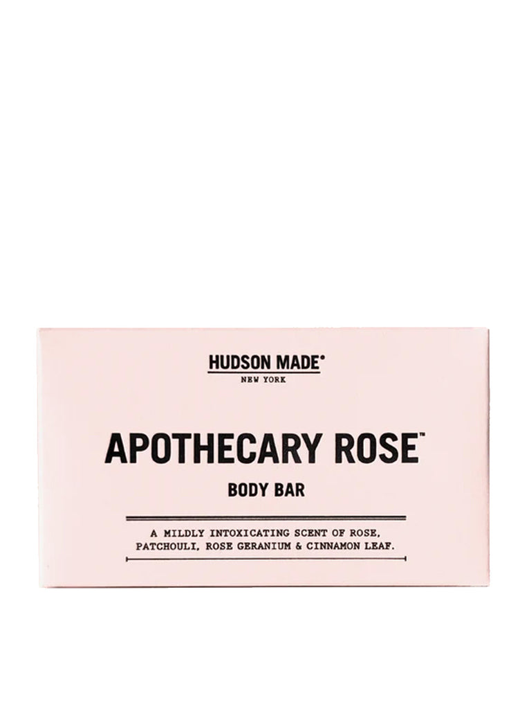 A rose colored boxed body bar soap.  Hudson Made is on top with "Apothecary Rose" in the center.  The copy below reads "mildly intoxicating scent or rose, patchouli, rose geranium and cinnamon leaf". 