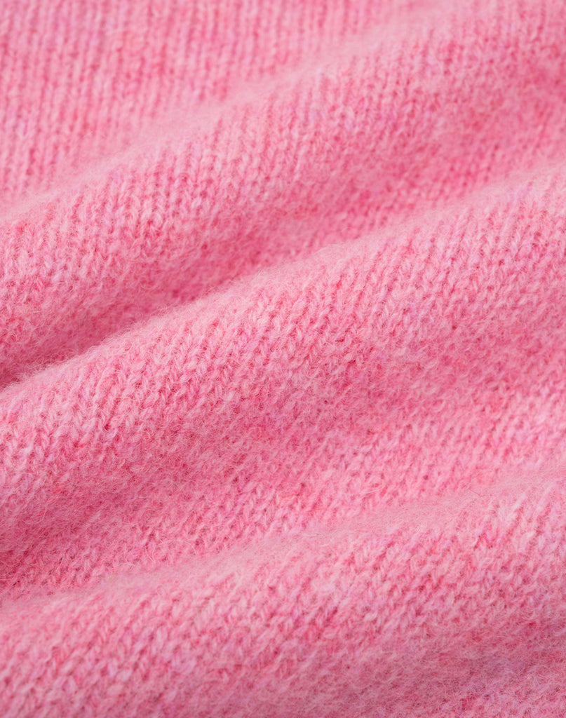 Photo 2 of 2.  Close-up of pink wool texture