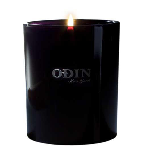 01 Owari fullsize candle that is lit with Odin New York logo printed on outside of the vessel. 